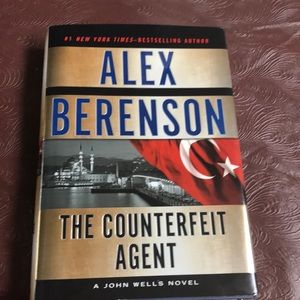 “The counterfeit agent” John Wells novel by Alex Berenson